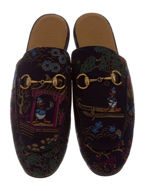 gucci donald duck slippers.